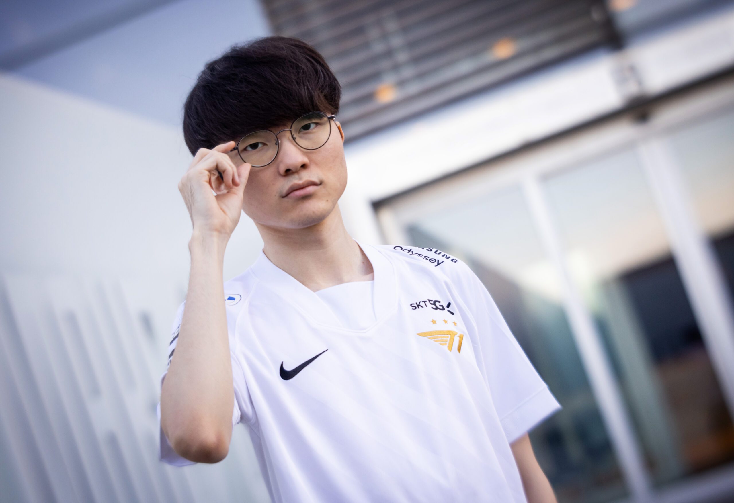 Faker adjusts his glasses at Worlds 2021