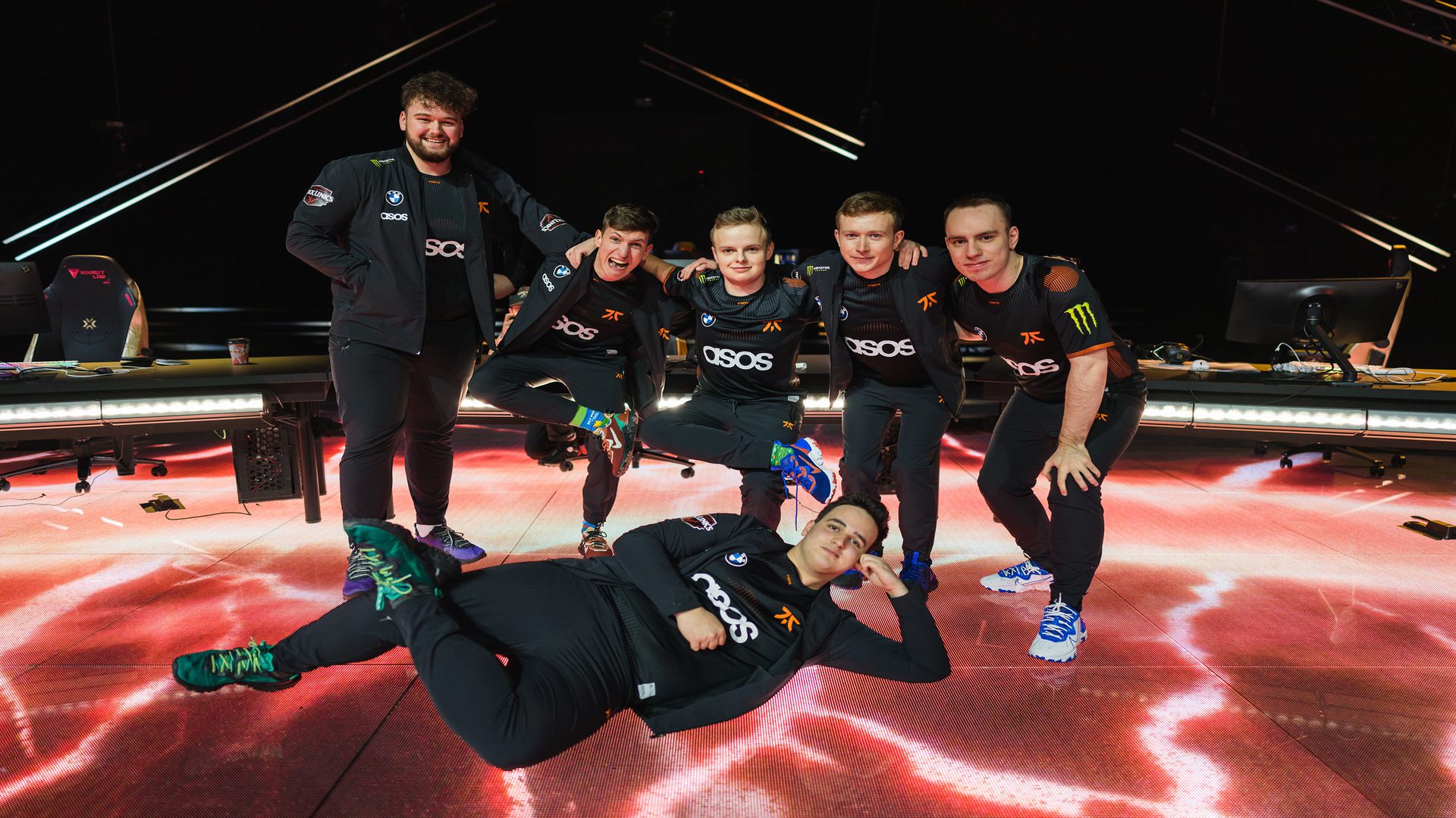 eam Fnatic poses after a win at the VALORANT Champions Groups Stage on December 3 in their black VCT Champions jerseys