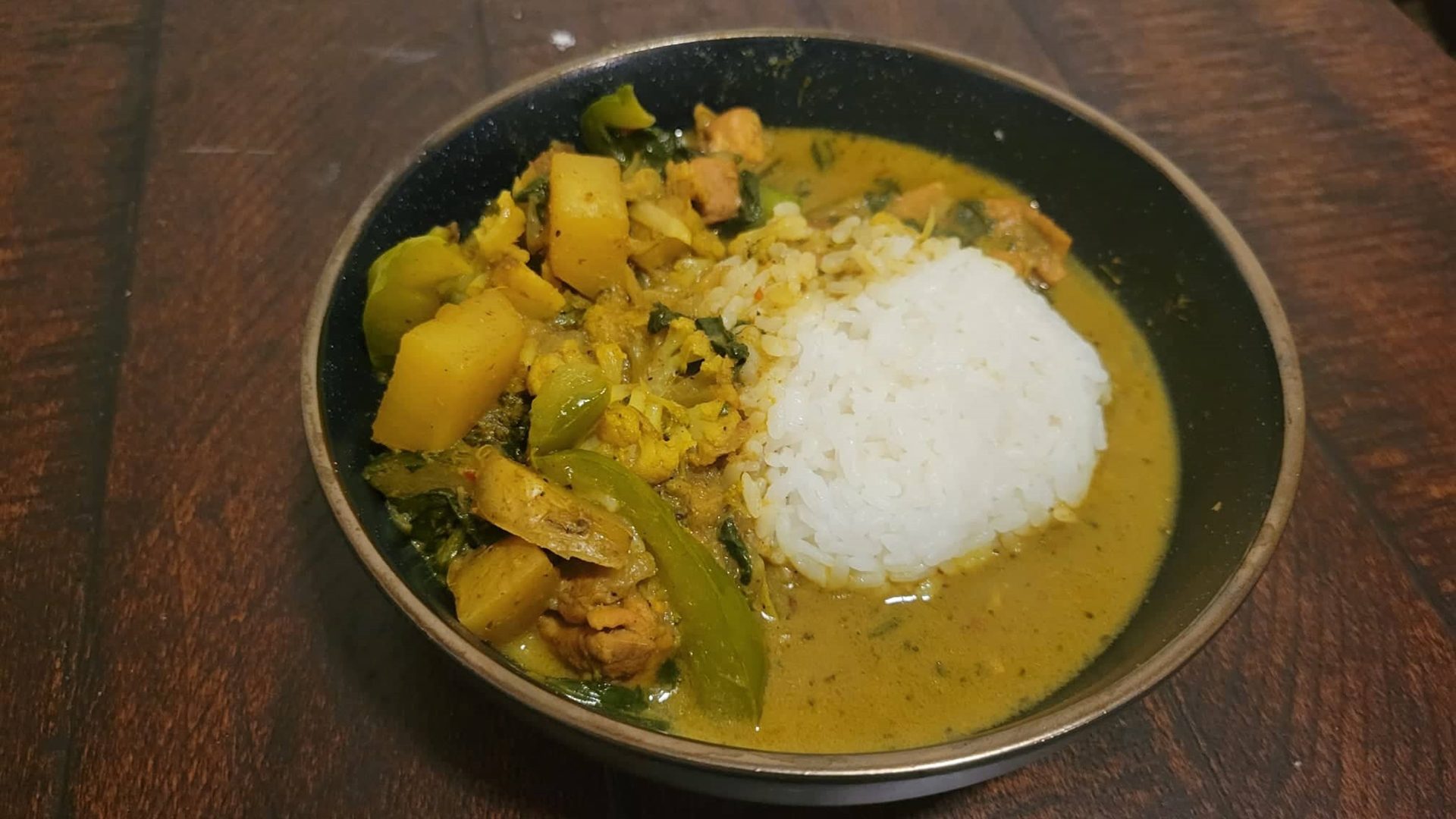 Green curry with chicken and coconut rice.