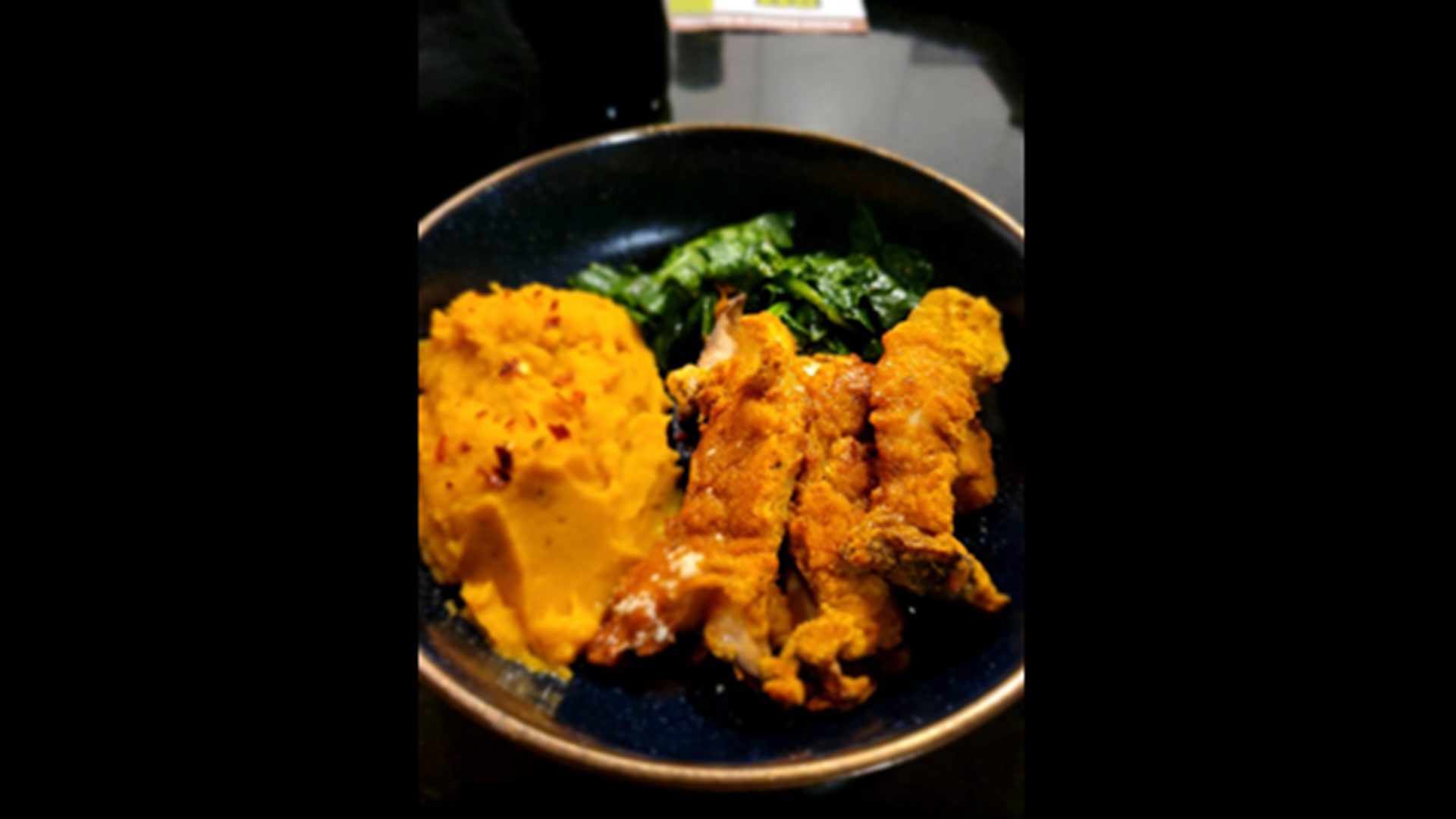 Fried oyster mushrooms, sweet potato puree and cooked greens.